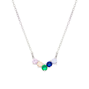 Rainbow Wishbone Necklace – 925 Silver & CZ Jewellery by Urban Pizazz. Discover our 925 silver Rainbow Wishbone Necklace with colourful CZ stones. A dainty symbol of luck, love & positivity. Hypoallergenic & gift-ready.