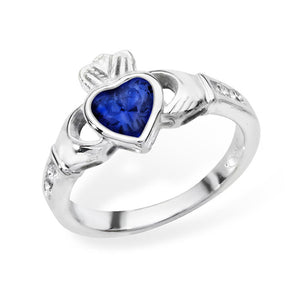Shop the September birthstone Claddagh ring at Urban Pizazz. Featuring a heart-shaped sapphire cubic zirconia in sterling silver. Perfect gifting jewellery.