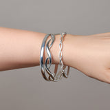 A selection of silver bangles by Urban Pizazz