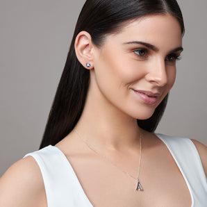 Urban Pizazz Model Wearing Our Sterling Silver CZ Initial Pendant Necklace A