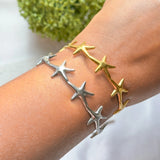 Amnesia Jewellery | Starfish cuff bracelet Gold Plated Or Stainless Steel. Discover the beauty of the ocean with our Starfish Cuff Bracelet, crafted from 18ct gold plated stainless steel or stainless steel. Tarnish free and waterproof. Shop now for quality Jewellery/Jewelry!