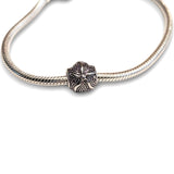 Sterling silver starfish bead charm - perfect for charm bracelets or necklaces. Hypoallergenic, beautifully detailed and gift-ready with coastal charm.