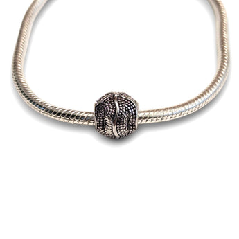 Sterling silver starfish bead charm - perfect for charm bracelets or necklaces. Hypoallergenic, beautifully detailed and gift-ready with coastal charm.