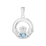 Silver claddagh pendant with a blue gemstone on a white background