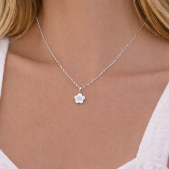 Sterling Silver Dainty Flower Pendant Necklace on Model