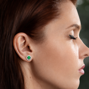 Urban Pizazz Model Wearing 925 Sterling Silver Emerald Halo Cubic Zirconia Stud Earrings