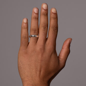 Silver 5mm Wedding Band on model's hand