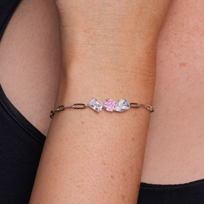 Urban Pizazz Model Wearing 925 Sterling Silver Unity Toi et Moi Paperclip Bracelet, Featuring Pink and Clear Cubic Zirconia Stones