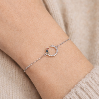 Urban Pizazz Model wearing our Sterling Silver Open Circle Bracelet with Cubic Zirconia Details