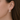 Urban Pizazz Model Wearing925 Sterling Silver and Rose Gold Teardrop Statement Stud Earrings with Cubic Zirconia Details