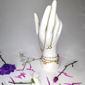 Amnesia Jewellery | Gold Plated Stainless Steel Cassie Paperclip Chain Bracelet. Our Cassie twisted paperclip bracelet is made from gold plated stainless steel with multi coloured enamel and sailors clasp. Tarnish Free and Waterproof. Shop now for quality Jewellery/Jewelry!