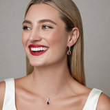 Urban Pizazz Model Wearing 925 Sterling Silver Ruby Cubic Zirconia Teardrop Necklace and matching earrings