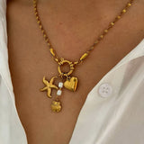Amnesia Jewellery | Gold Plated and Pearl Droplet twisted sea necklace